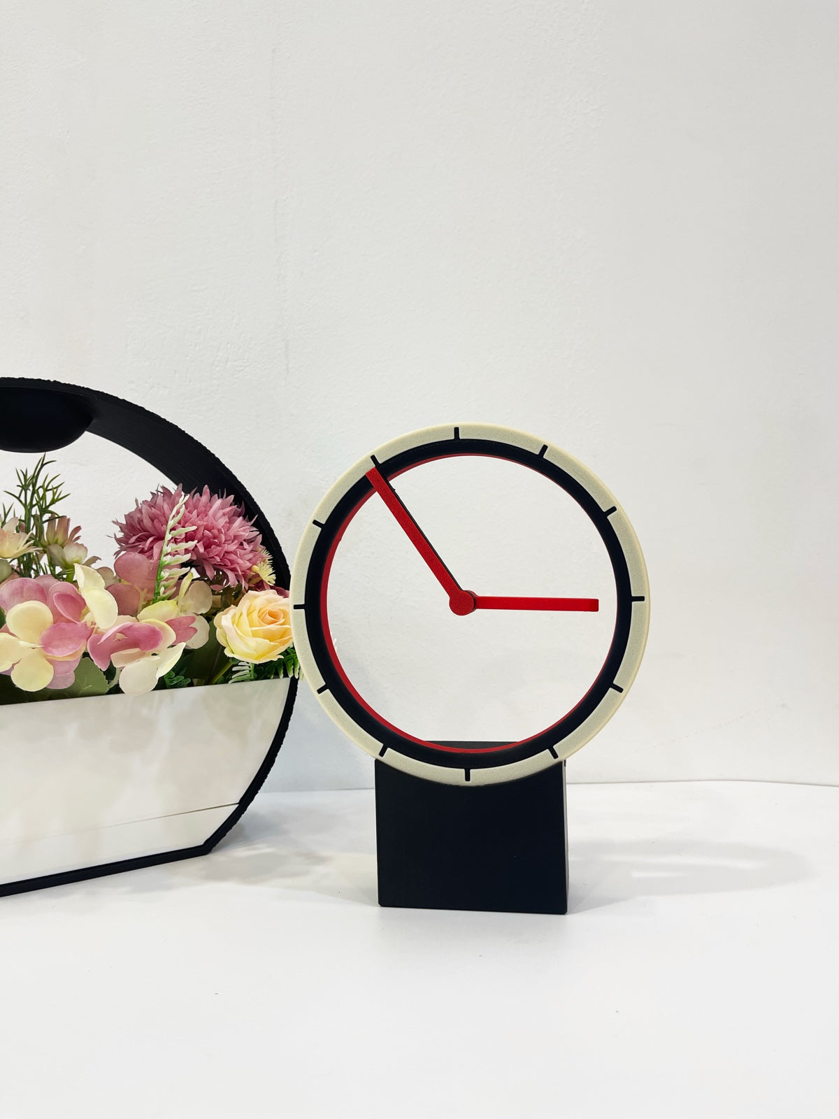 Kickback Clock — full product shot, matte finish, red signal hands